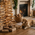 Wooden Christmas tree decorated with warm fairy lights and ornaments in a cozy living room, with a cat and golden retriever resting nearby.