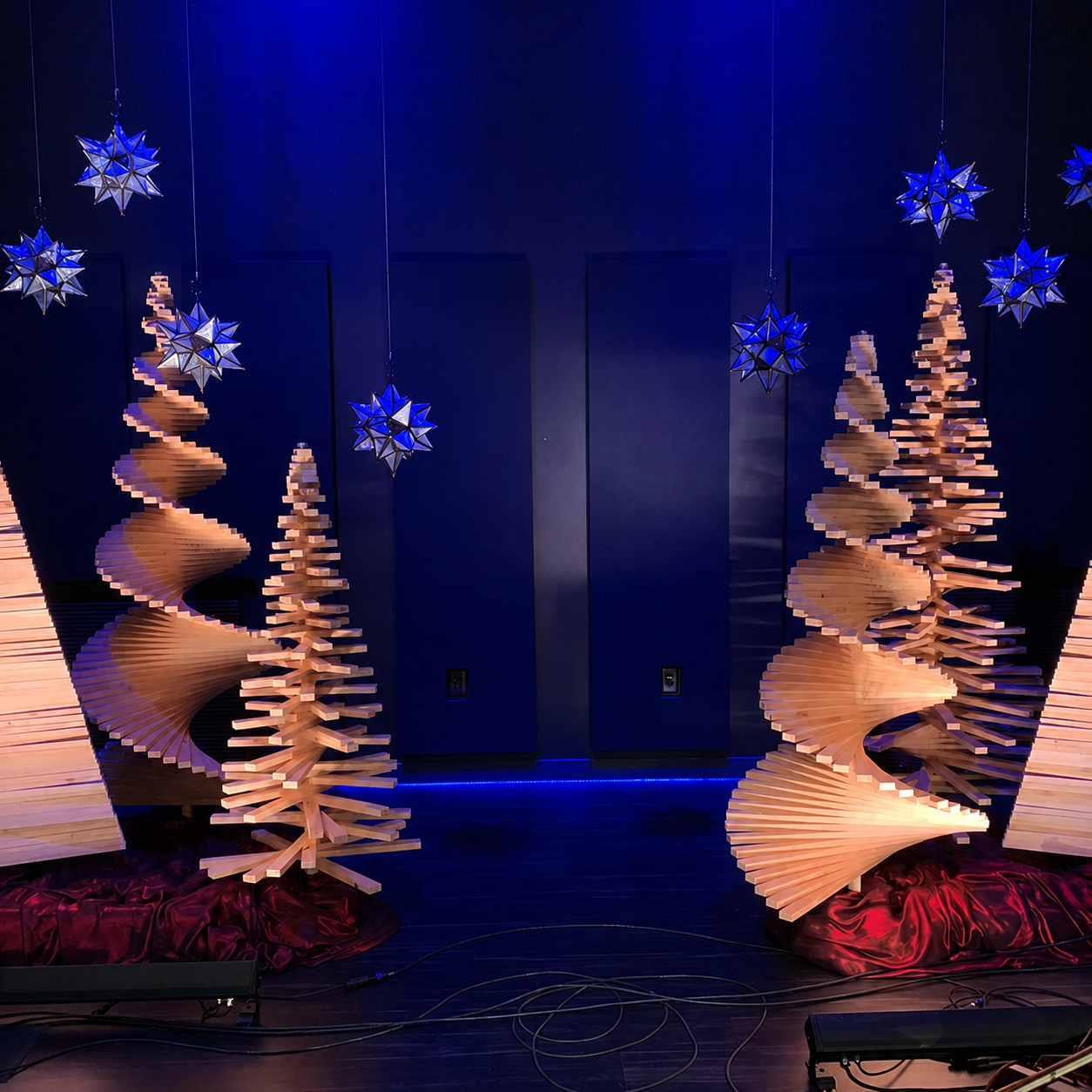 Handmade wooden Christmas tree with rotating branches and natural wood design