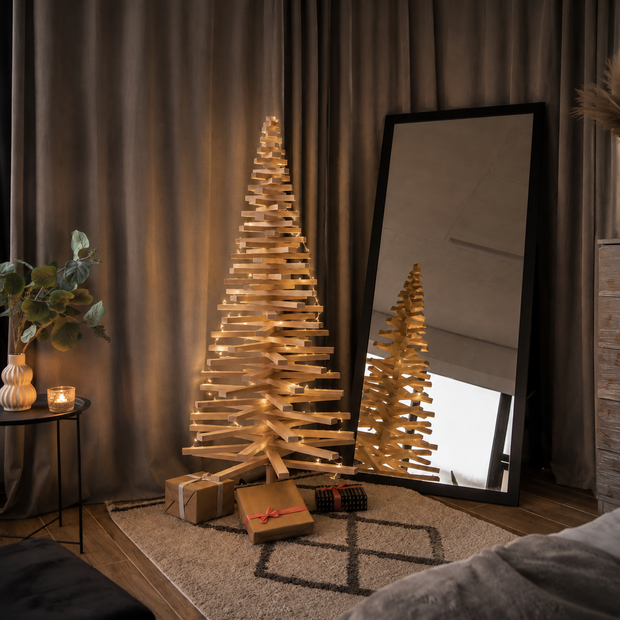 Handmade wooden Christmas tree with rotating branches and natural wood design