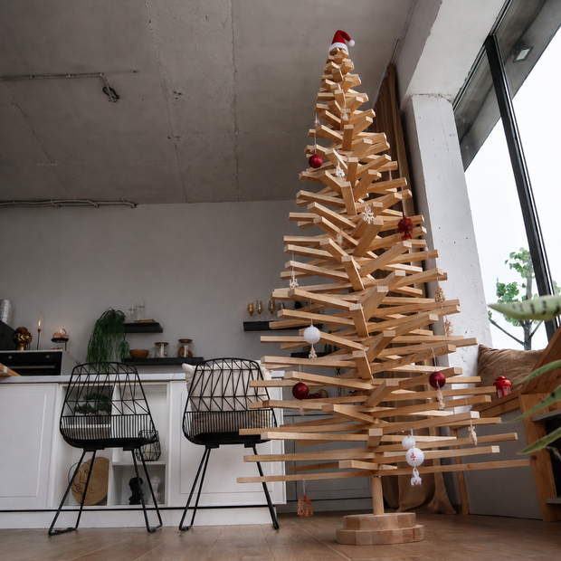 Handmade wooden Christmas tree with rotating branches and natural wood design