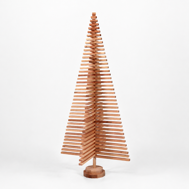 Handmade wooden Christmas tree with rotating branches and natural wood design