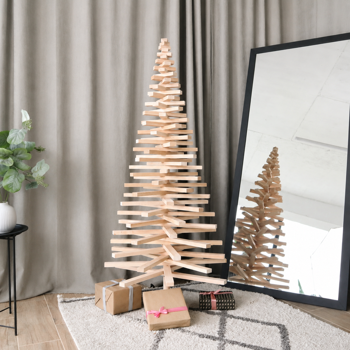 Handmade wooden Christmas tree with rotating branches and natural wood design