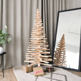 Handmade wooden Christmas tree with rotating branches and natural wood design