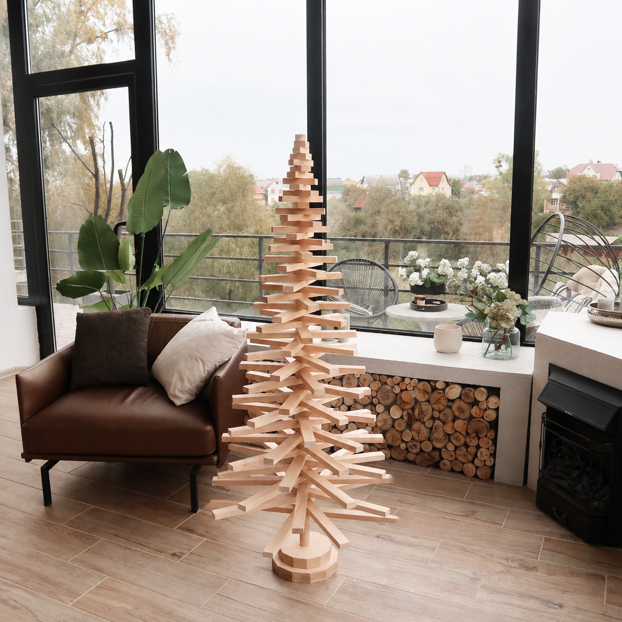 Handmade wooden Christmas tree with rotating branches and natural wood design