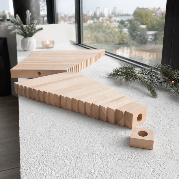 Handmade wooden Christmas tree with rotating branches and natural wood design