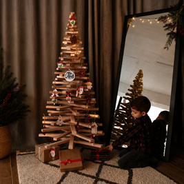 Handmade wooden Christmas tree with rotating branches and natural wood design