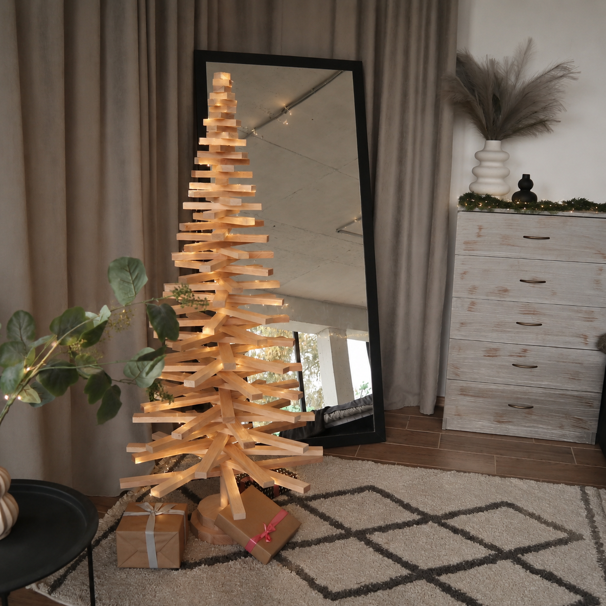 Handmade wooden Christmas tree with rotating branches and natural wood design