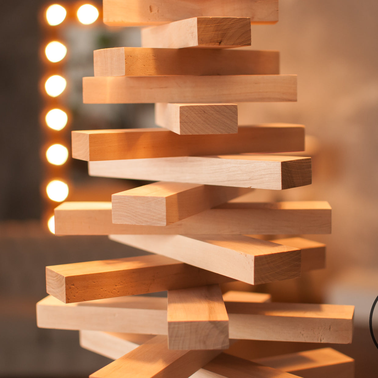 Handmade wooden Christmas tree with rotating branches in modern Scandinavian living room