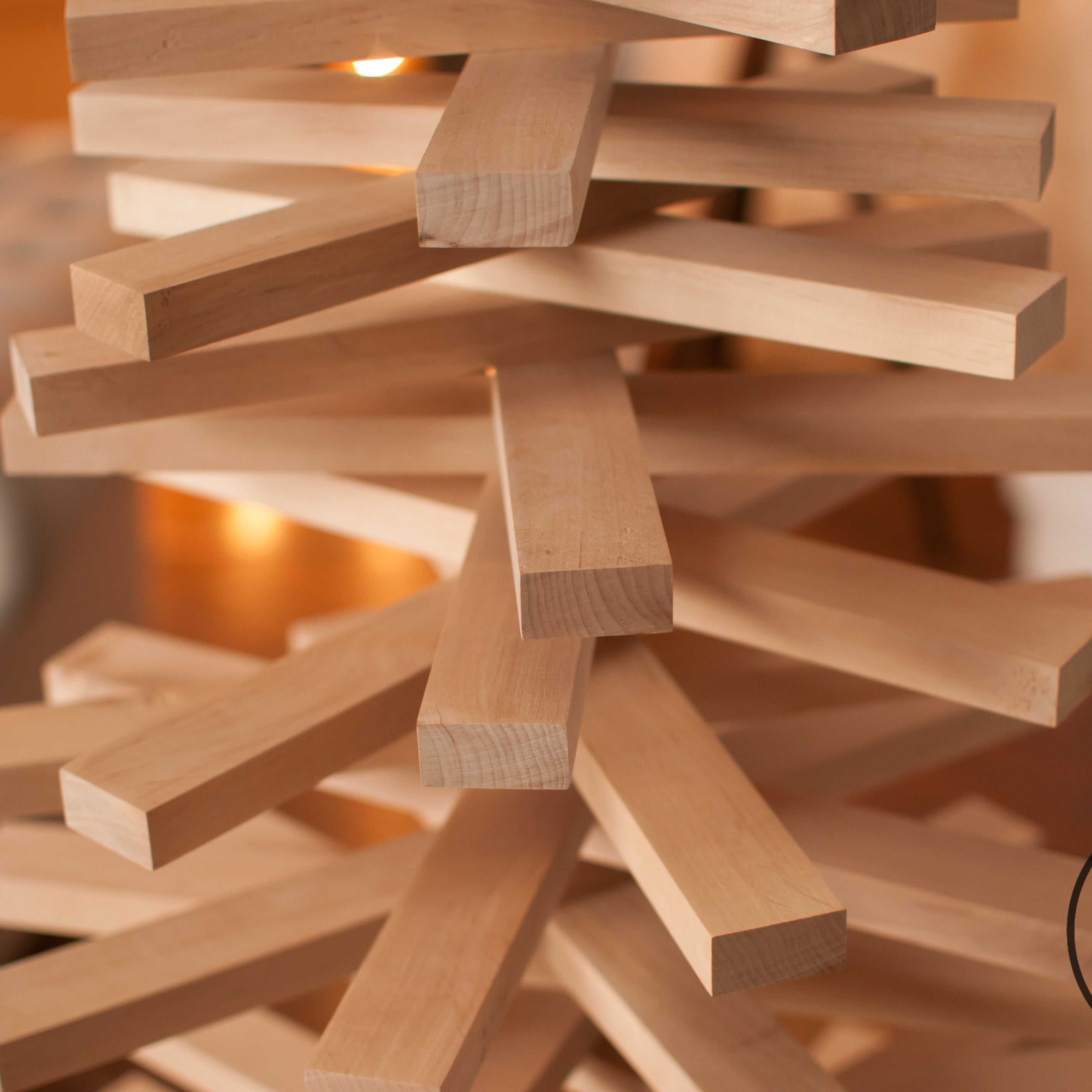 Handmade wooden Christmas tree with rotating branches in modern Scandinavian living room